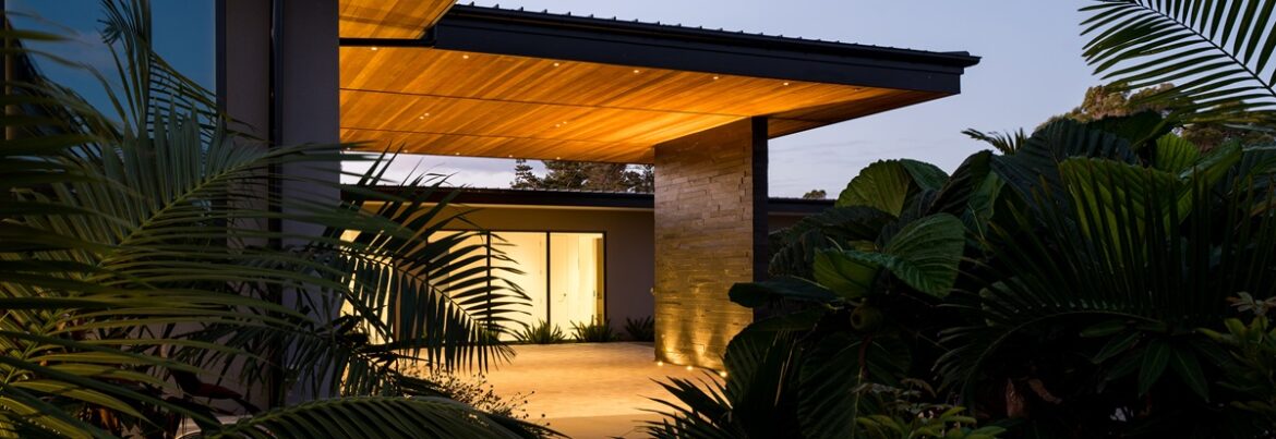 Exterior entry lighting design highlighting stone & timber